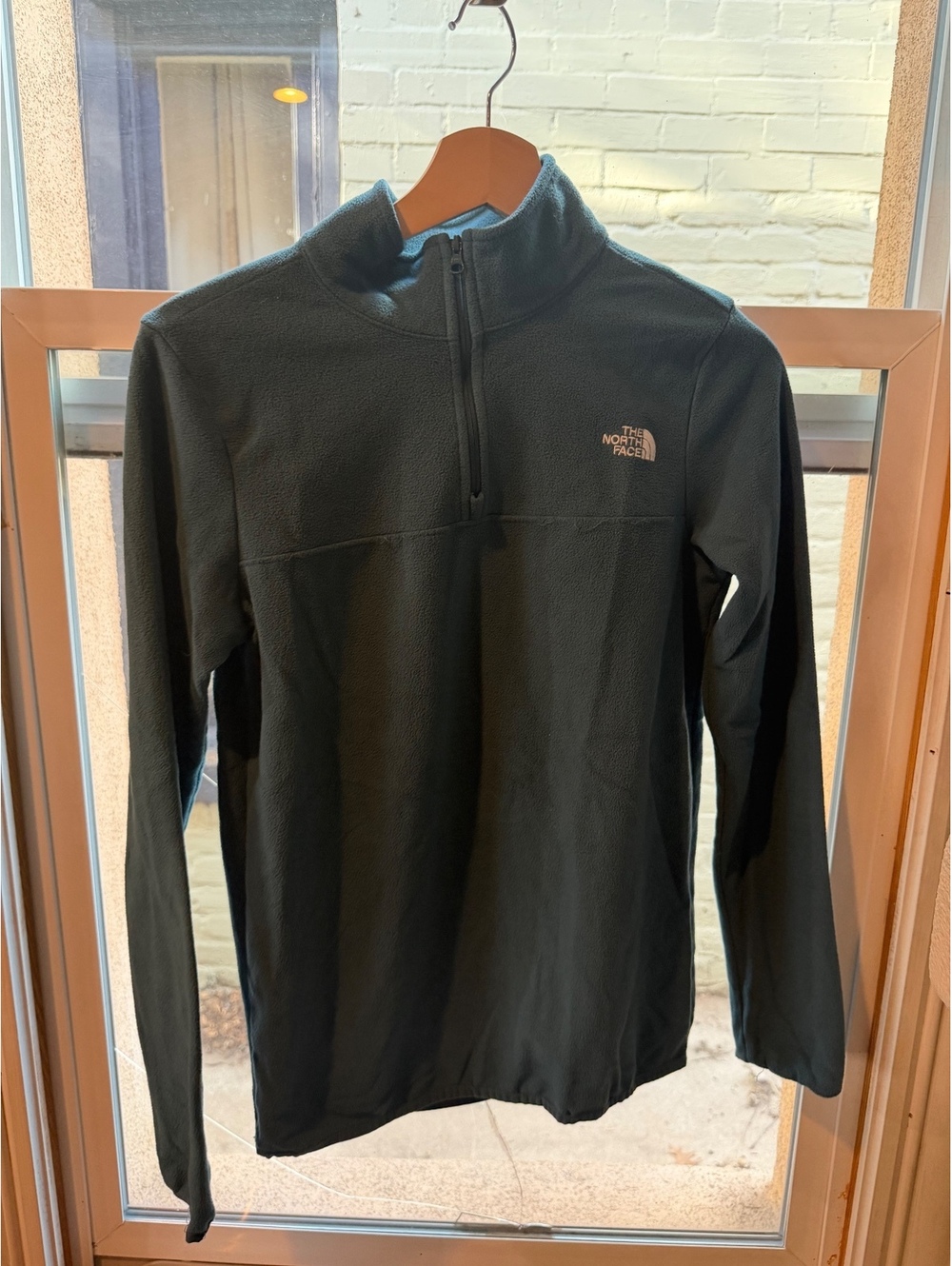The North Face teal quarter zip fleece